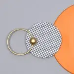 Sleek Horizon Contemporary Metal Wall Clock in Striking Orange and Gold - Image 4