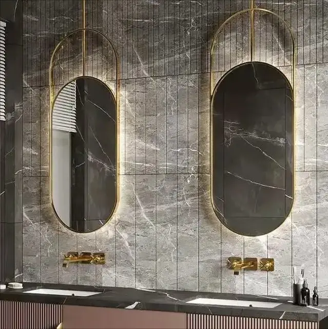 Pair of Bouchet Luxurious Gold Metal Frame Wall Mirror - Elegant Suspended Oval shaped wall accent - Image 1