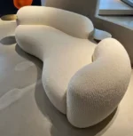 Lobby Hotel Curve Scandinavian Sofa Curved Minimalistic Couch With Steel Armrest in Gold PVD Finish - Image 8