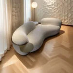 Lobby Hotel Curve Scandinavian Sofa Curved Minimalistic Couch With Steel Armrest in Gold PVD Finish