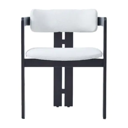 Lintel Bouclé Dining Armchair - an ivory bouclé back and seat on a graphic dark frame