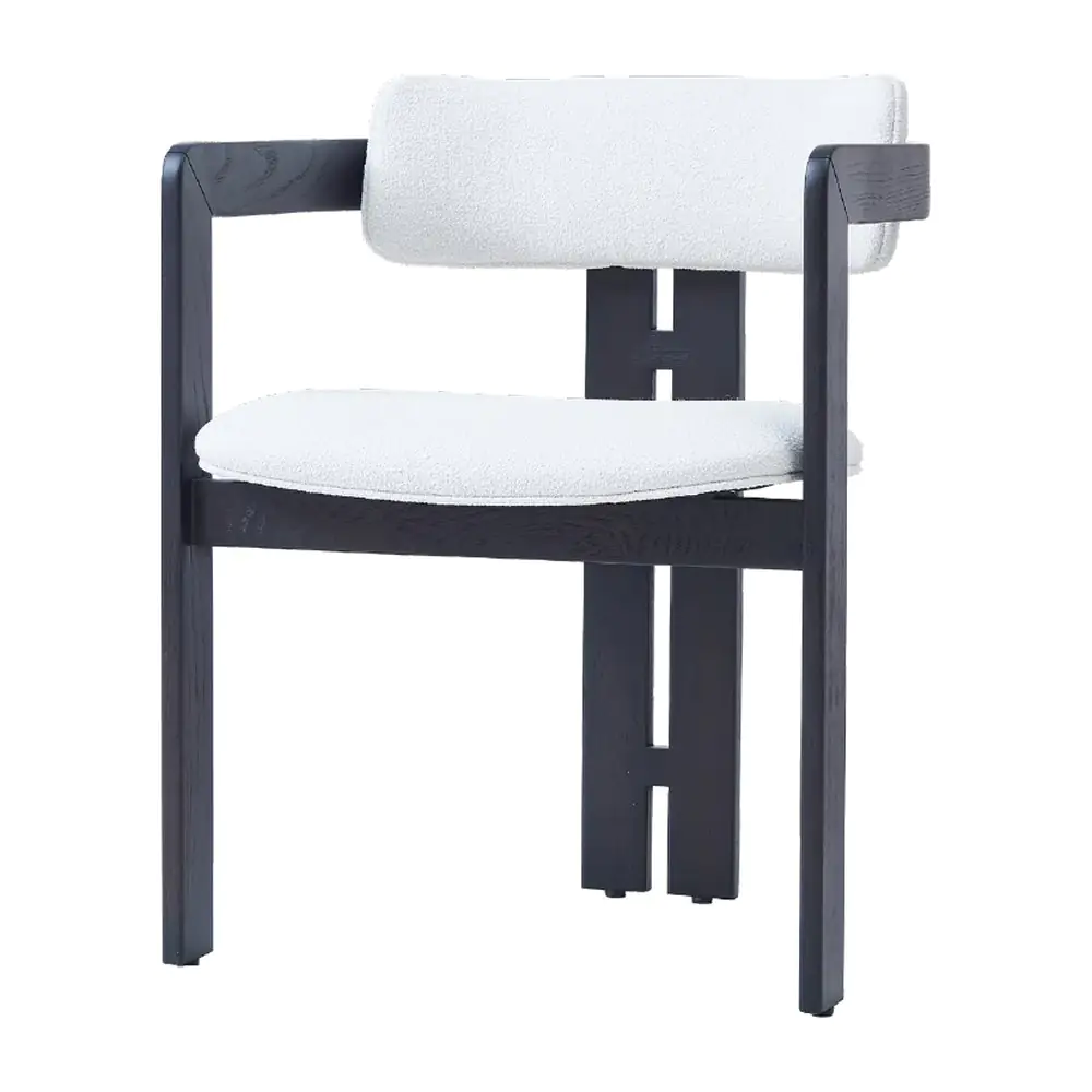 Lintel Bouclé Dining Armchair - an ivory bouclé back and seat on a graphic dark frame (alternate view)