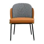 Pied Dining Chair - a houndstooth back with a tan seat on black legs