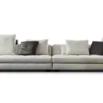 Lunar Low-Profile Sofa - a pale grey low-slung frame with a mix of scatter cushions