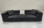 Basalt Leather Sofa - black leather with stitched panels and a generous depth