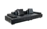 Ebony Low Leather Sofa - black quilted leather with a low, wide stance